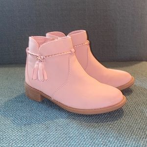 Little girl, pink boots